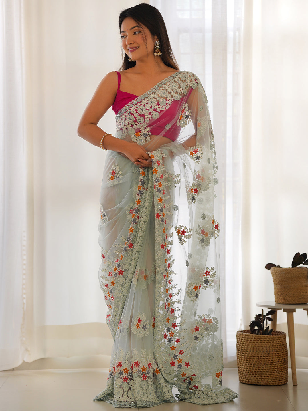 Women's Net Embroidery Work Saree With Unstitched Blouse Piece