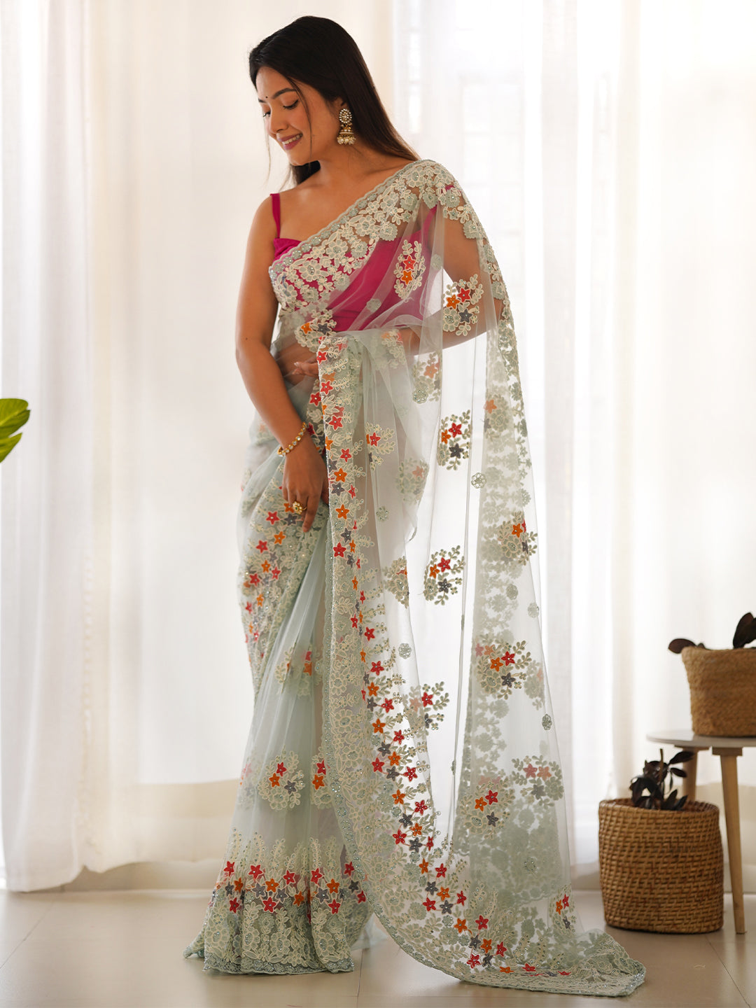 Women's Net Embroidery Work Saree With Unstitched Blouse Piece