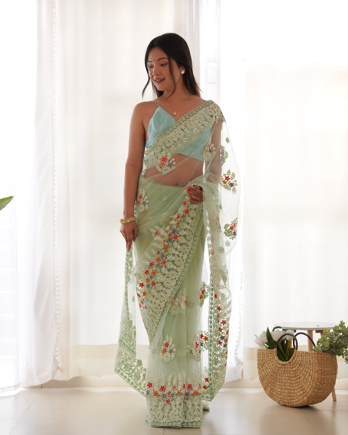 Women's Net Embroidery Work Saree With Unstitched Blouse Piece
