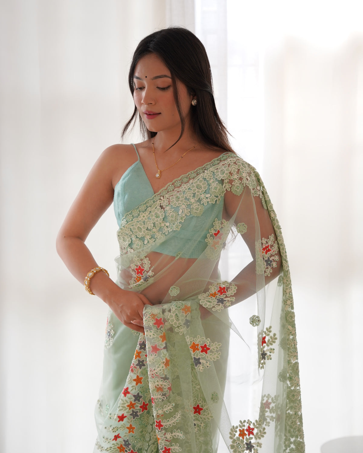 Women's Net Embroidery Work Saree With Unstitched Blouse Piece