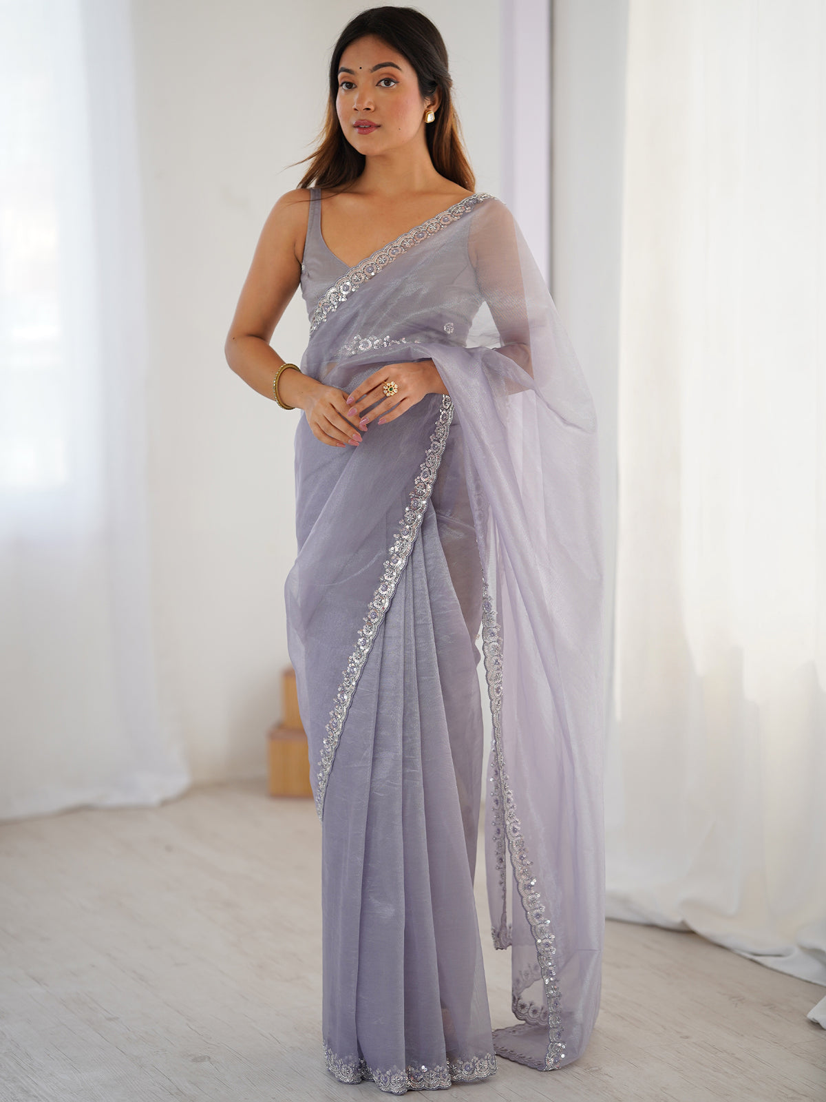 Women's Net Sequence Work Saree With Unstitched Blouse Piece