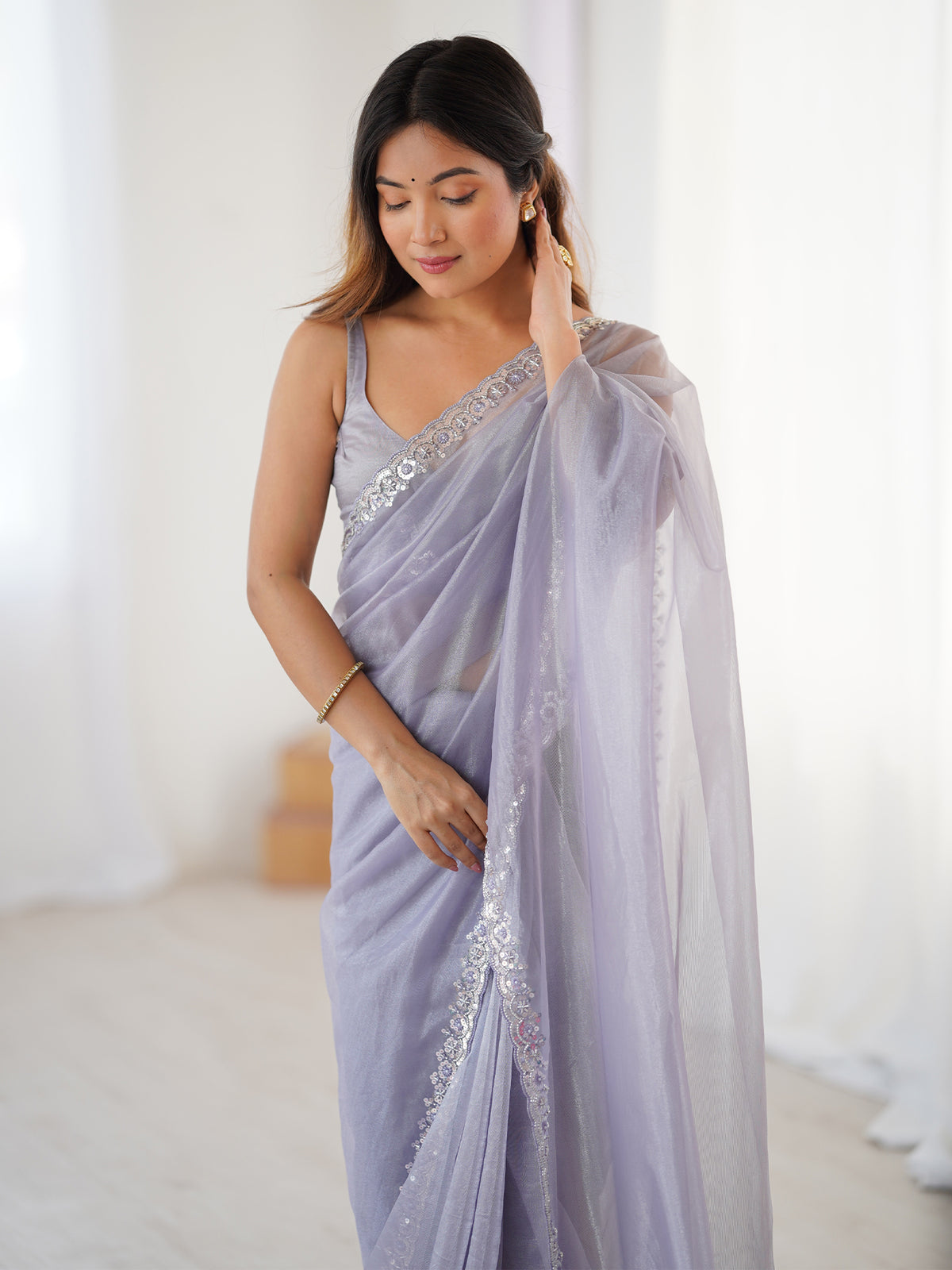 Women's Net Sequence Work Saree With Unstitched Blouse Piece