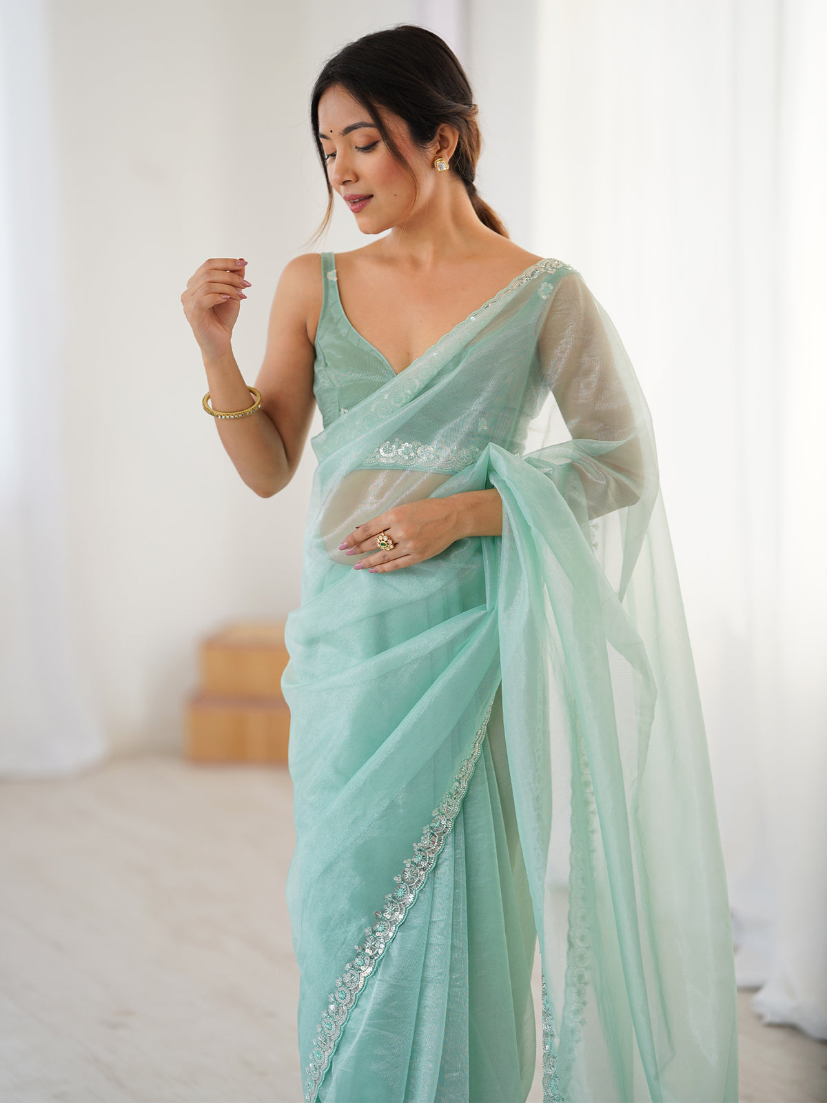 Women's Net Sequence Work Saree With Unstitched Blouse Piece
