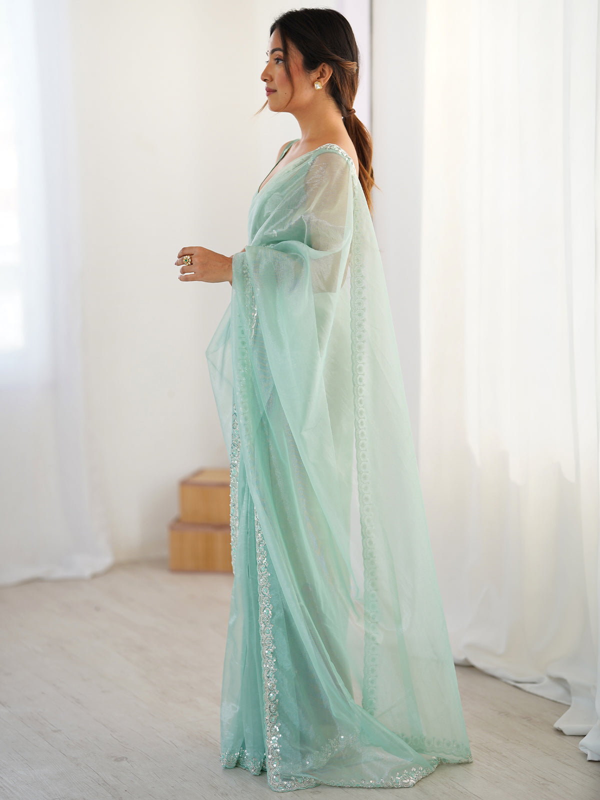 Women's Net Sequence Work Saree With Unstitched Blouse Piece