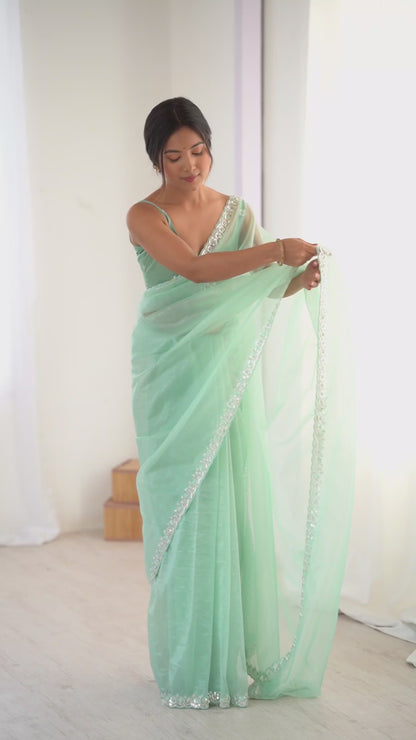 Women's Net Sequence Work Saree With Unstitched Blouse Piece